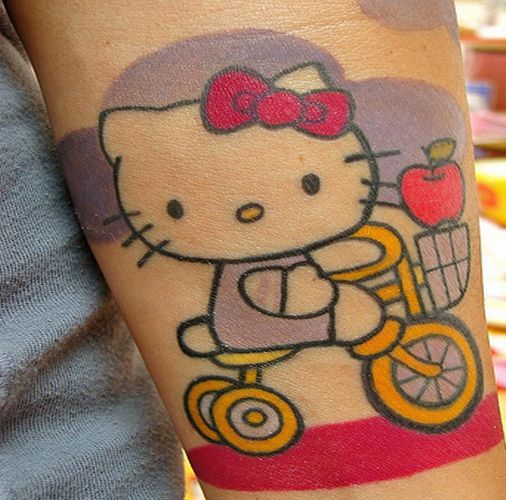 hello kitty tattoos. Hello Kitty Tattoos On Arm.