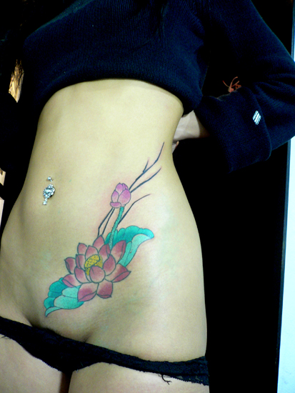 tattoos on stomach for women. stomach flower tattoos