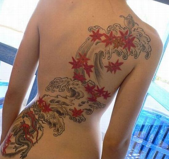 back tattoos of flowers. japanese ack tattoo.